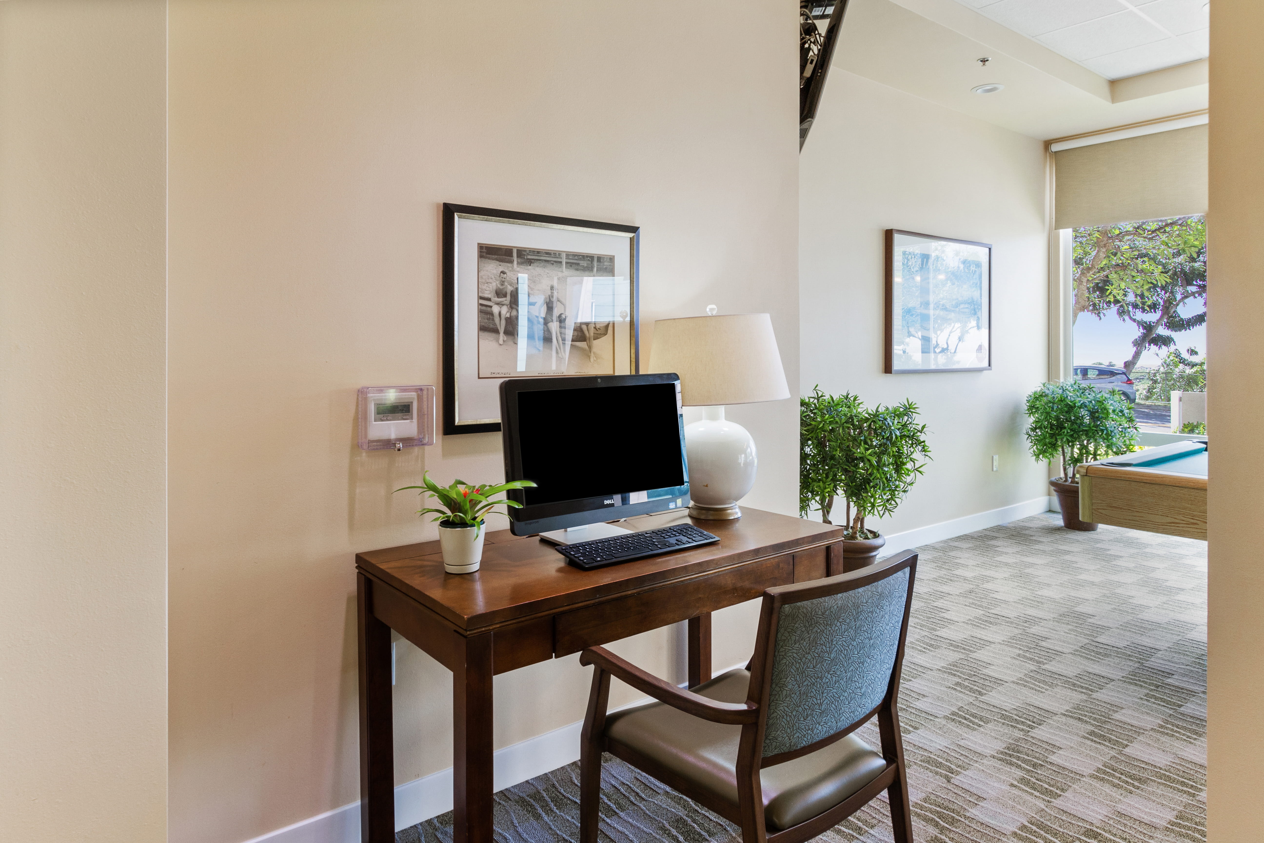 Computer workstation and billiard room at the plaza assisted living Moanalua.