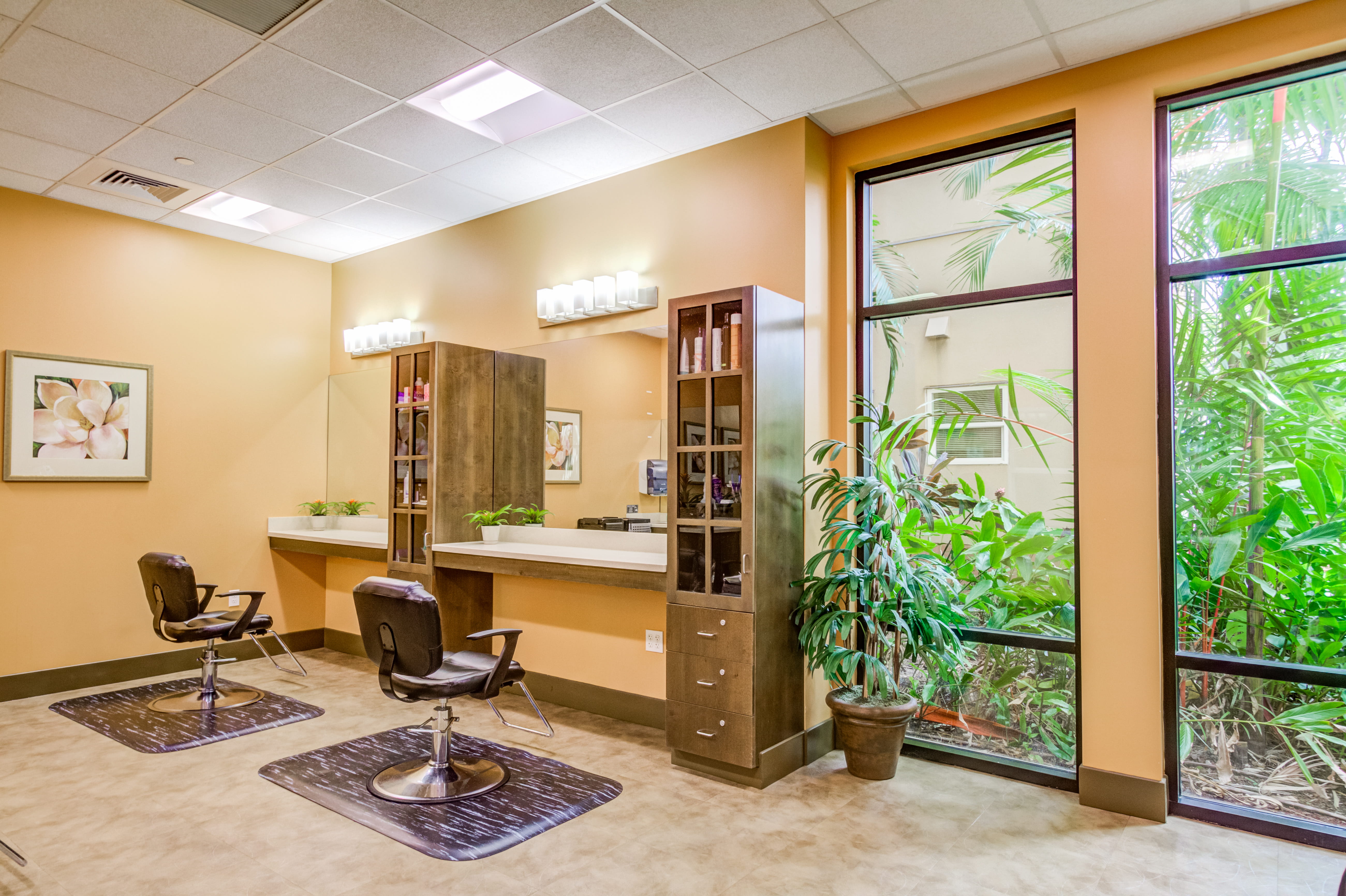 Full-service beauty salon with a tropical view at The Plaza Assisted Living.