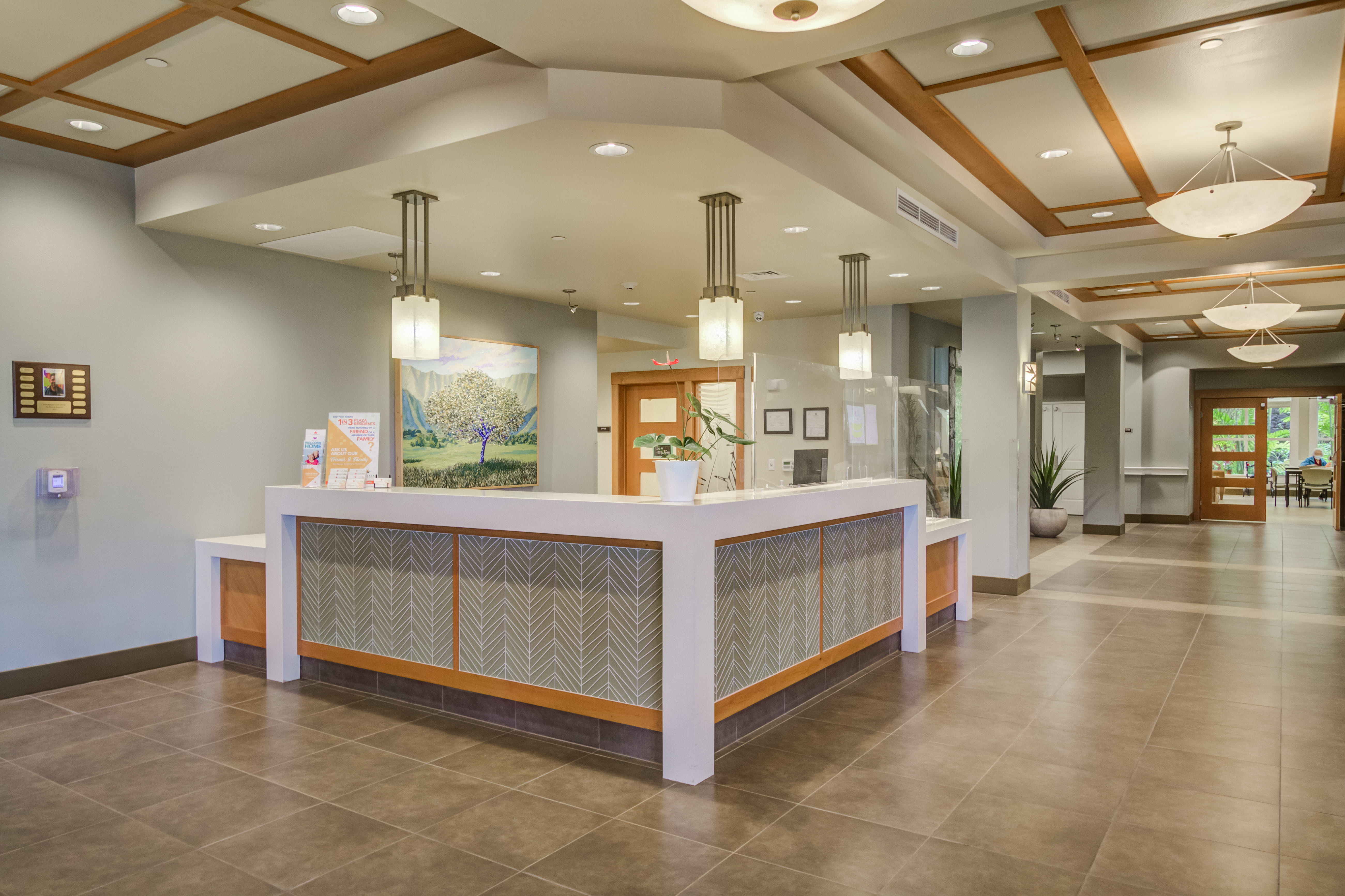 Modern reception and information desk at The Plaza Assisted Living.