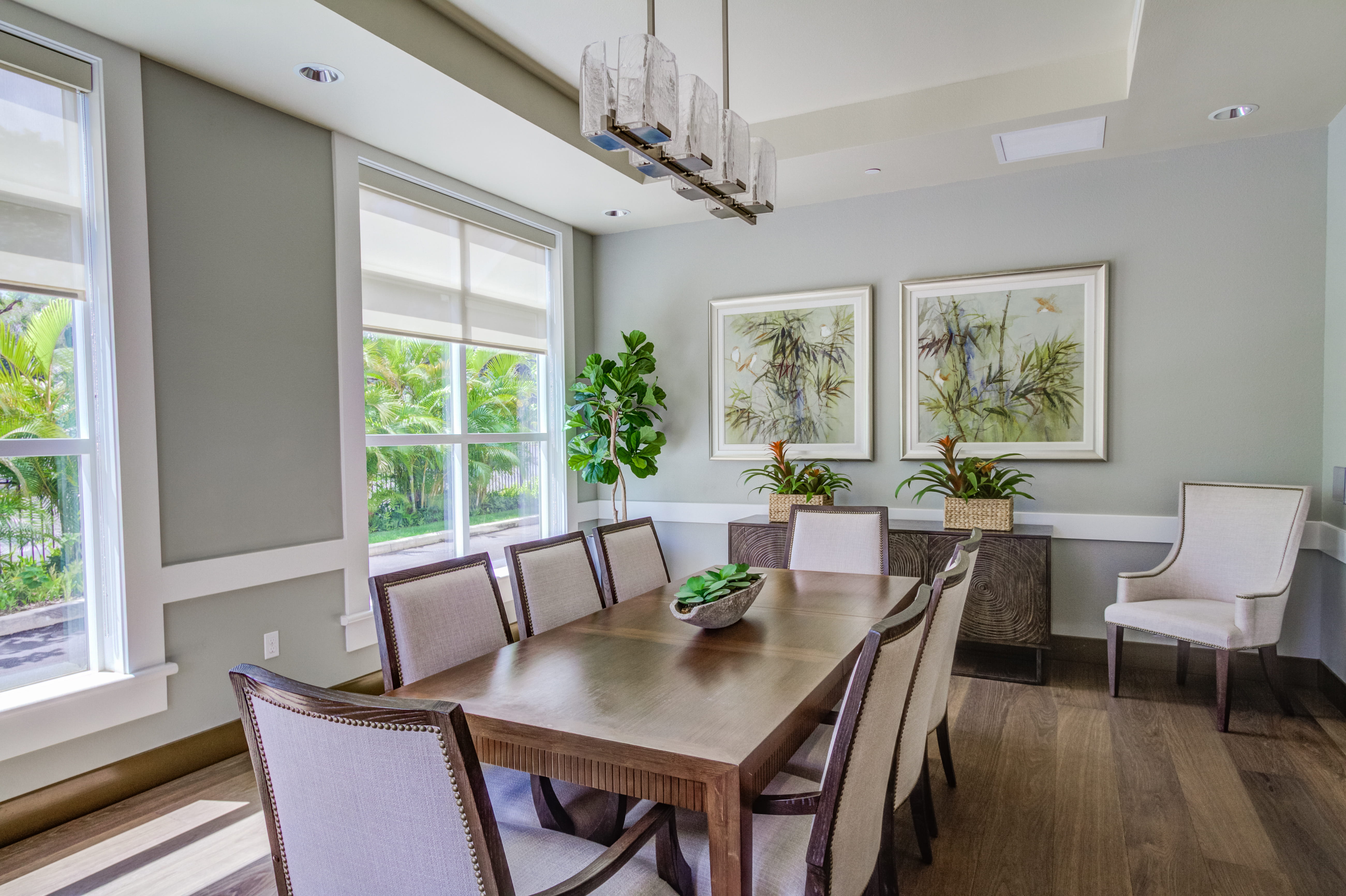 Private dining room with elegant furniture at The Plaza Assisted Living.